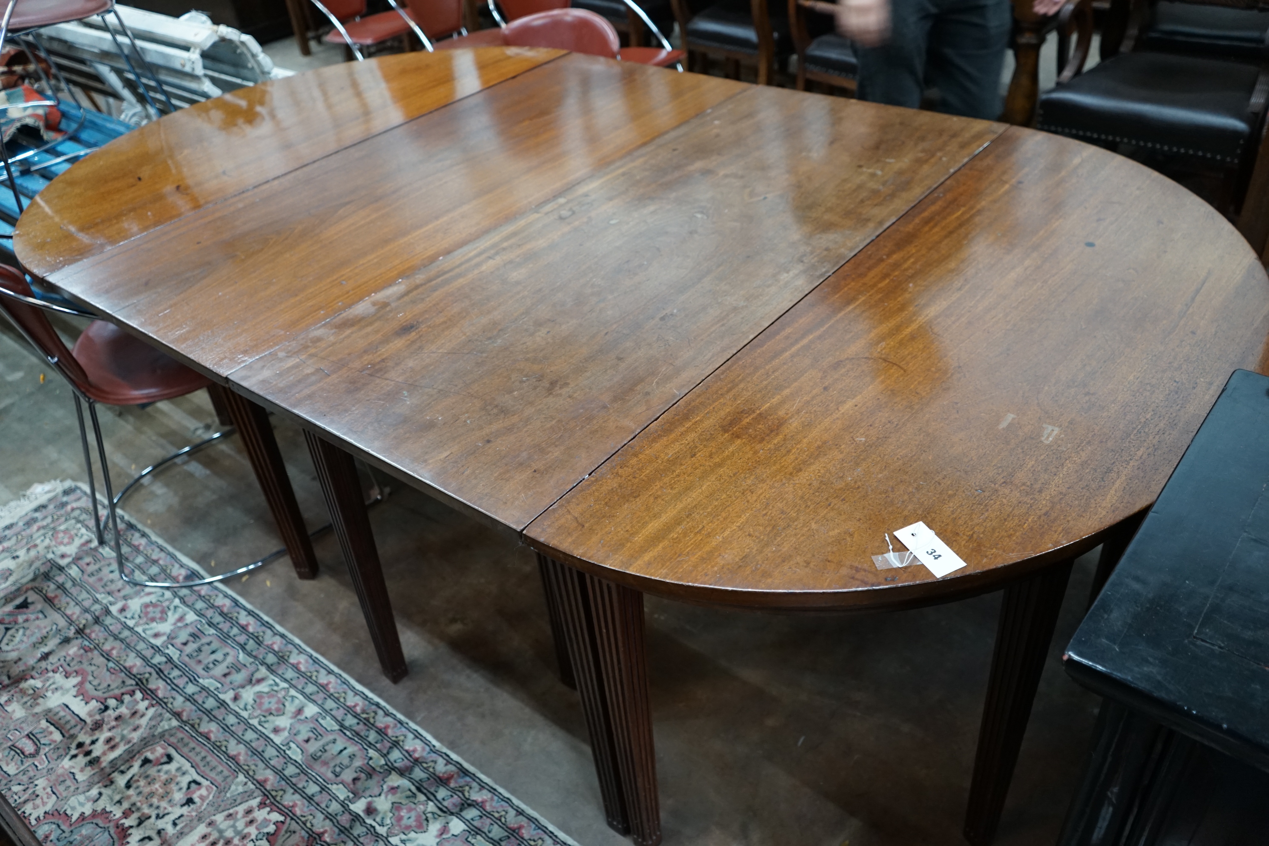 A George III mahogany D end extending dining table, extended 221cm width 132cm height 72cm